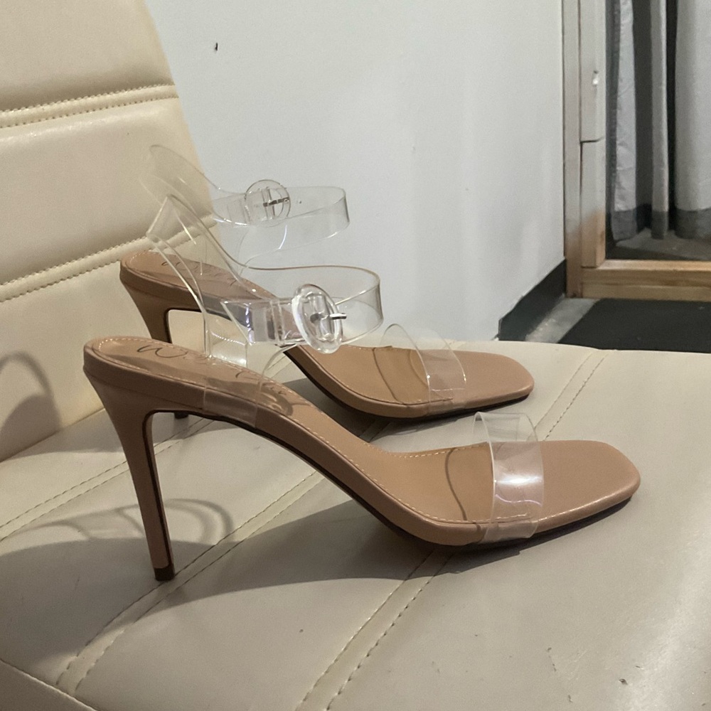 Women’s cream color heels with clear straps